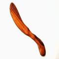 Wooden Wild Cherry spreading knife on white background.