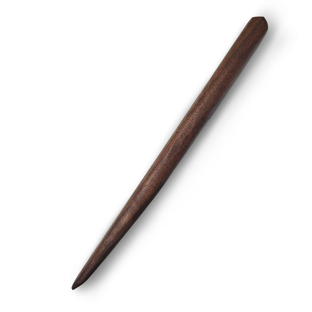 Wooden tapered sourdough starter mixing stick on white background.